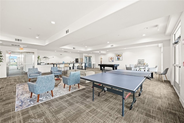 game room with a raised ceiling, carpet, and pool table