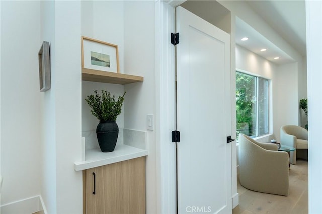 doorway with light hardwood / wood-style floors