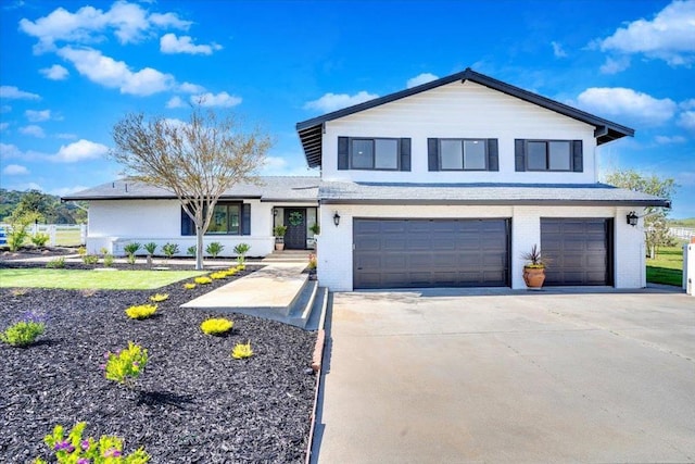 front facade with a garage