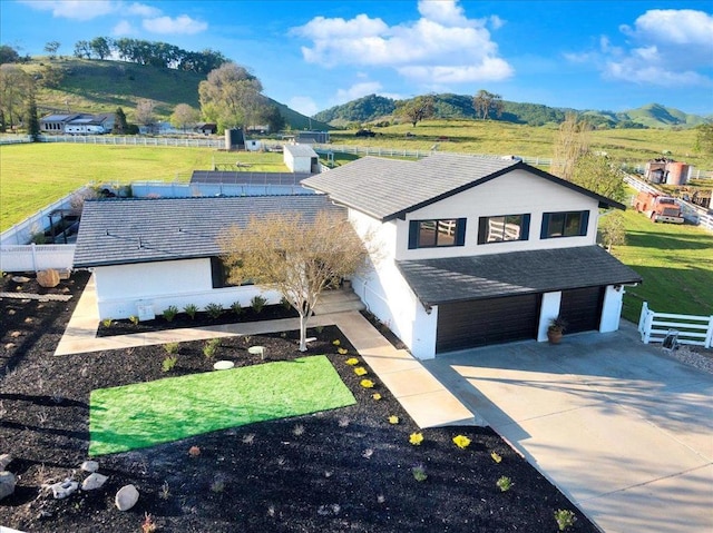 view of front of property with a mountain view