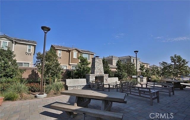 view of home's community featuring a patio area