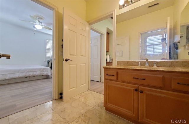 505 Lowe Dr, Placentia, CA 92870 - ensuite bathroom featuring vanity, a ceiling fan, and tile patterned flooring