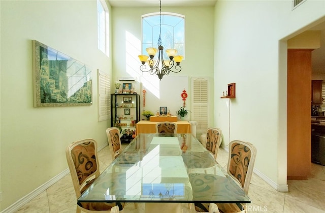 505 Lowe Dr, Placentia, CA 92870 - dining area with a chandelier, a high ceiling, and light tile patterned floors