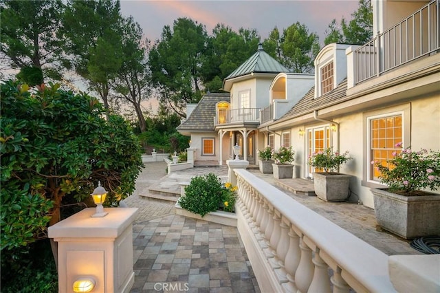 surrounding community featuring a patio area