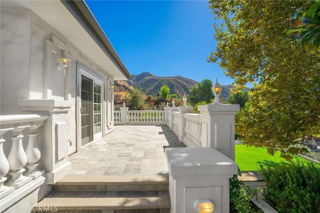 view of patio with a mountain view