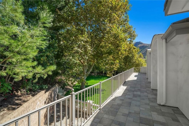 balcony featuring a mountain view