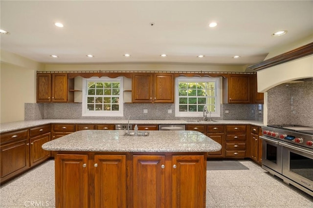 kitchen featuring tasteful backsplash, open shelves, stainless steel appliances, and a sink