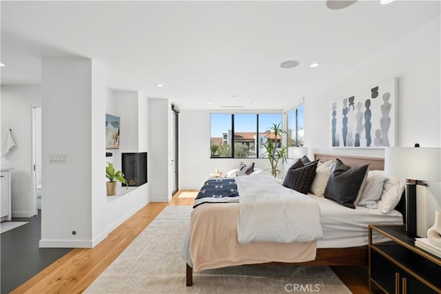 bedroom featuring light wood-type flooring