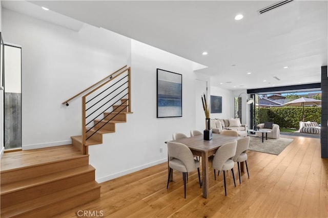 dining room featuring light hardwood / wood-style floors