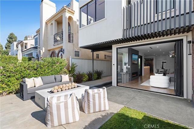 view of patio / terrace featuring a balcony and an outdoor hangout area