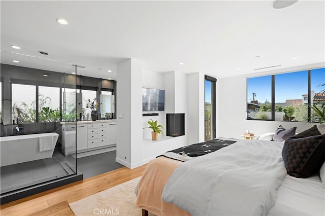 bedroom featuring light hardwood / wood-style floors