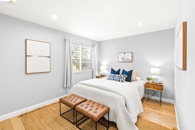 bedroom with light wood-type flooring