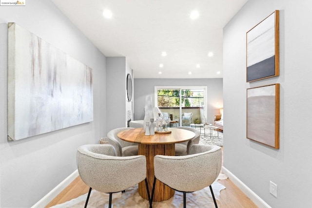 dining room featuring light wood-type flooring