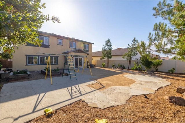 back of property featuring a patio area