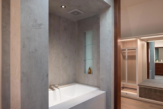 bathroom featuring hardwood / wood-style flooring