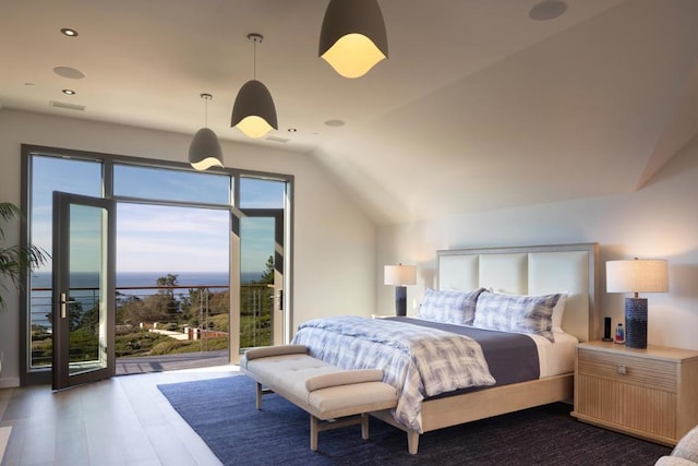 bedroom featuring dark hardwood / wood-style floors and lofted ceiling