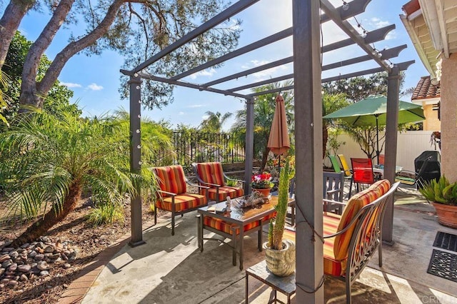 view of patio / terrace featuring a pergola