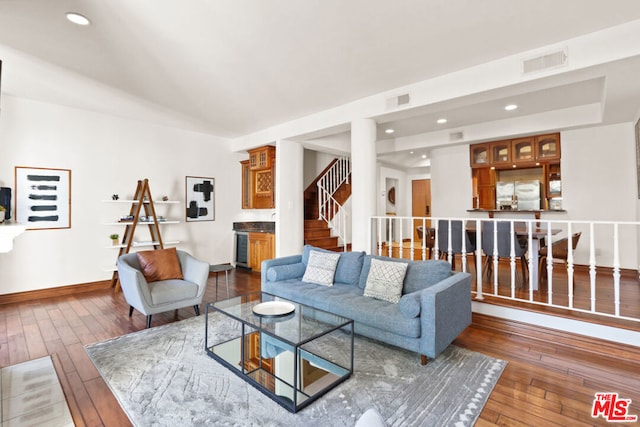 living room with dark wood-type flooring