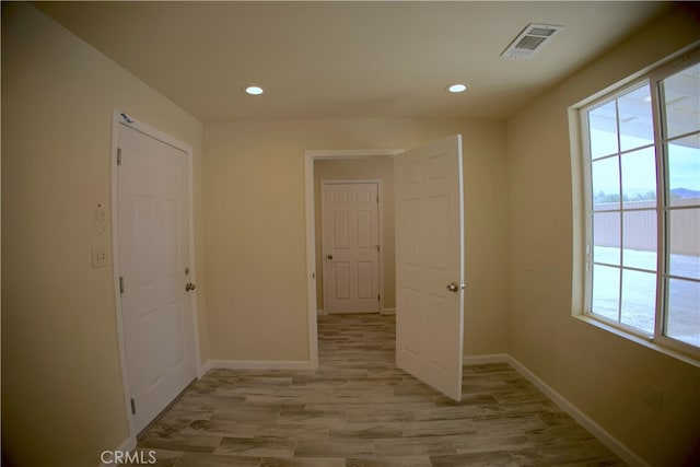 hall featuring light hardwood / wood-style flooring