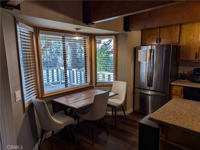 dining area featuring dark hardwood / wood-style flooring