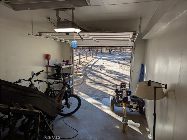 garage featuring a garage door opener