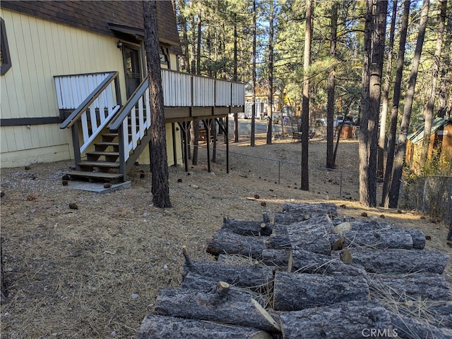 view of yard featuring a wooden deck