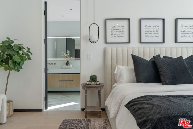 bedroom featuring light hardwood / wood-style flooring