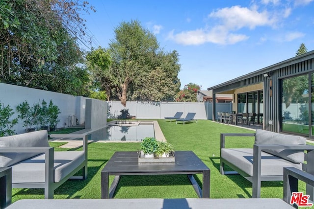 view of yard with a patio area and an outdoor hangout area