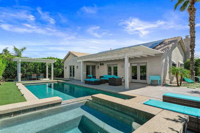 view of swimming pool with an in ground hot tub, an outdoor hangout area, a patio, and french doors