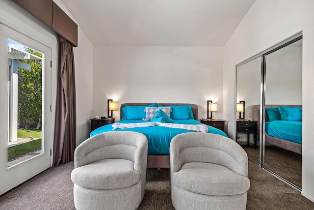 bedroom featuring multiple windows, a closet, and carpet flooring