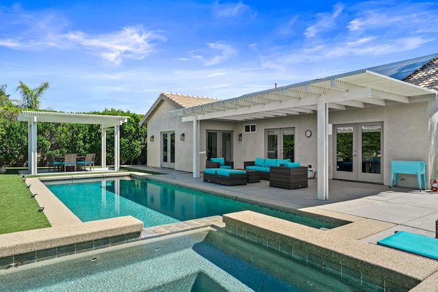 view of swimming pool featuring an in ground hot tub, a patio area, french doors, and outdoor lounge area