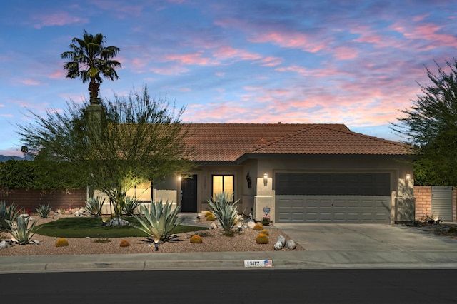 view of front of home with a garage