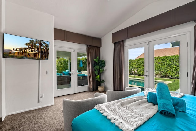 bedroom featuring french doors, multiple windows, access to exterior, and lofted ceiling