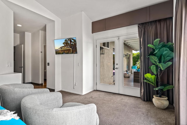 living room with french doors and carpet