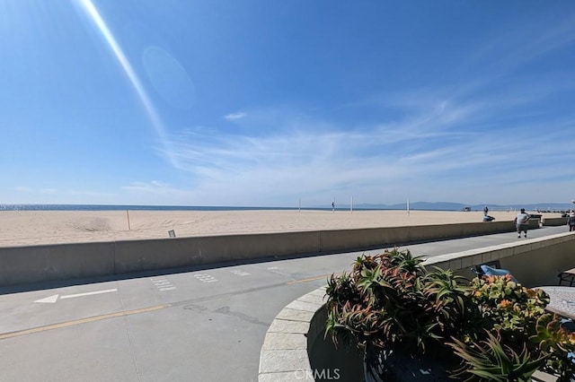 view of patio / terrace with a water view