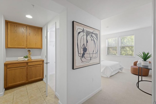 bedroom featuring light colored carpet