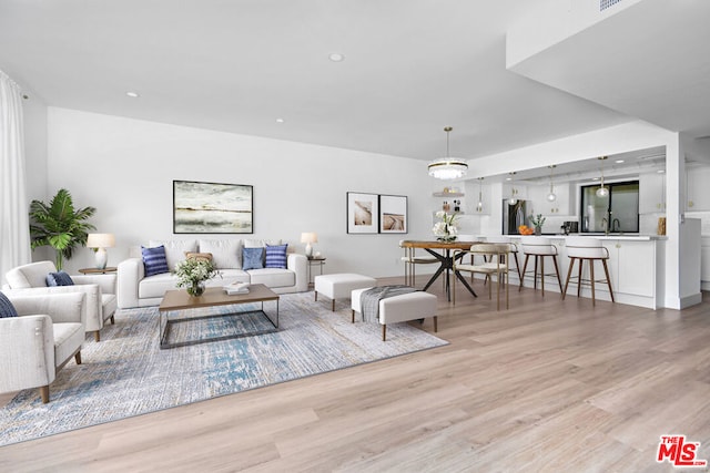 living room featuring light wood-type flooring