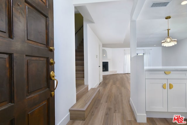 foyer entrance featuring light hardwood / wood-style floors