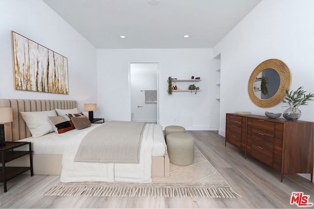 bedroom featuring light hardwood / wood-style floors