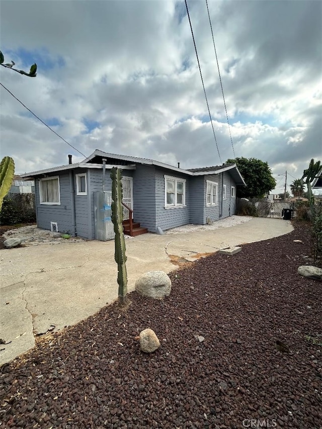 rear view of property with a patio area