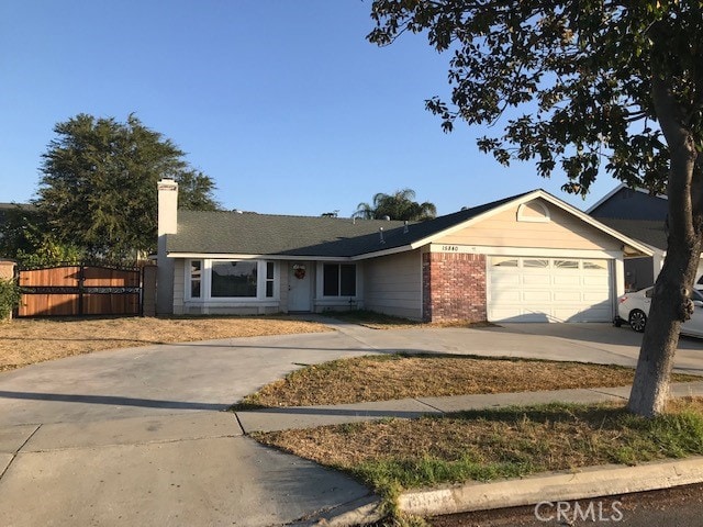 single story home with a garage