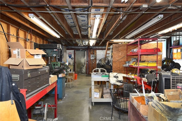 basement with a workshop area