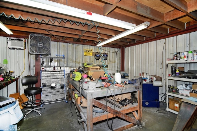 basement featuring an AC wall unit