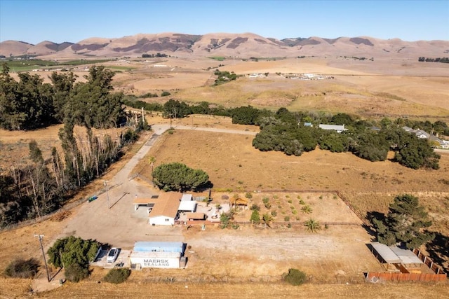 aerial view with a mountain view and a rural view