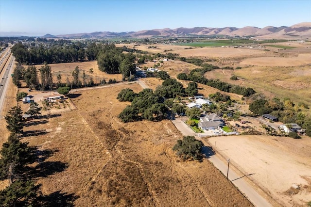 bird's eye view with a mountain view and a rural view