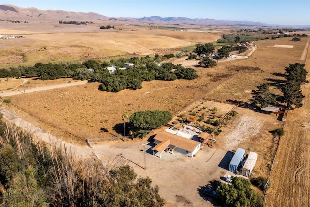 aerial view with a mountain view and a rural view