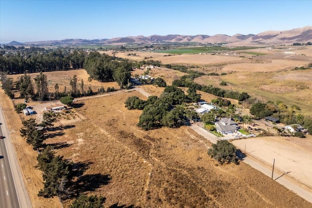 bird's eye view with a mountain view and a rural view