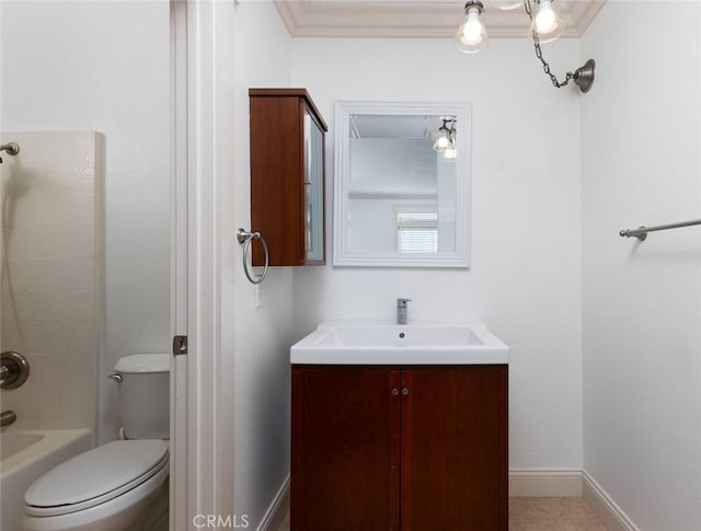 full bathroom featuring tile patterned floors, vanity, bathing tub / shower combination, crown molding, and toilet