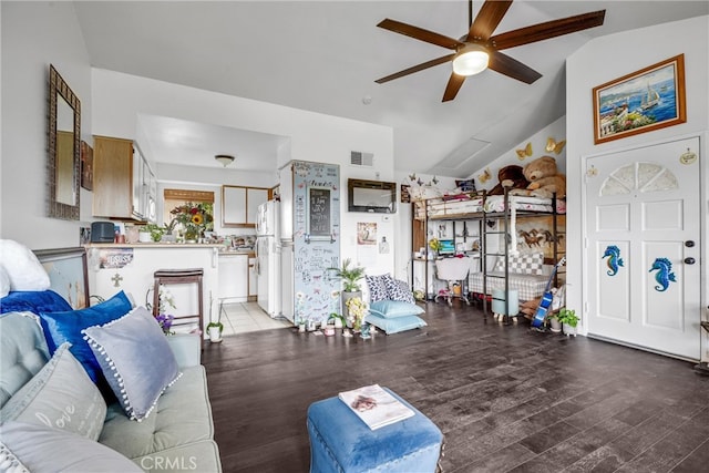 living room featuring vaulted ceiling, hardwood / wood-style flooring, and ceiling fan