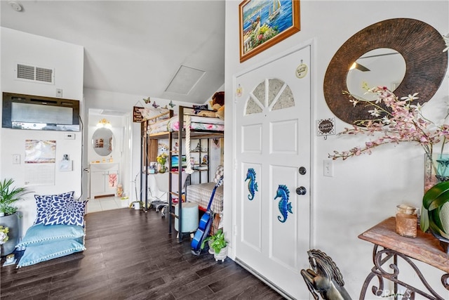 entrance foyer featuring dark hardwood / wood-style flooring